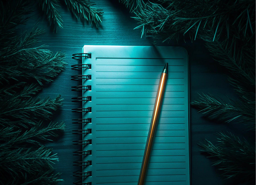 Dark moody desk setup with notepad and pencil, showcasing tailored engineering requirements