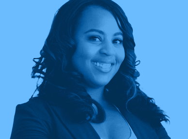 An image of a woman of color, looking confident. The image is tinted blue.