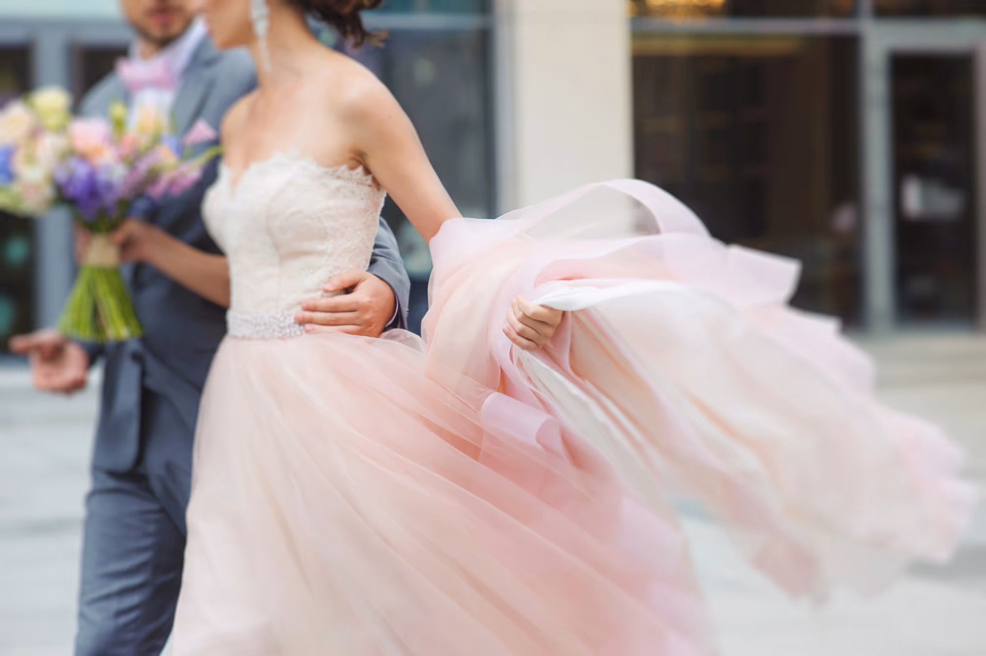 Our Expert Guide on How to Style a Pink Wedding Dress 