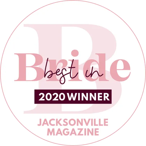 Best in Bride 2020 Winner badge from Jacksonville Magazine in pink and purple text inside a pink circle.