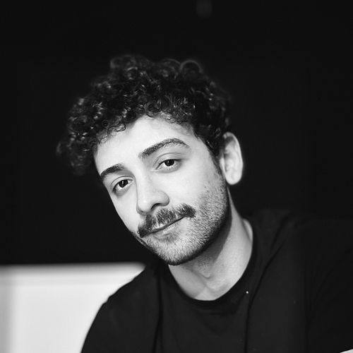 A headshot of me, in black and white.