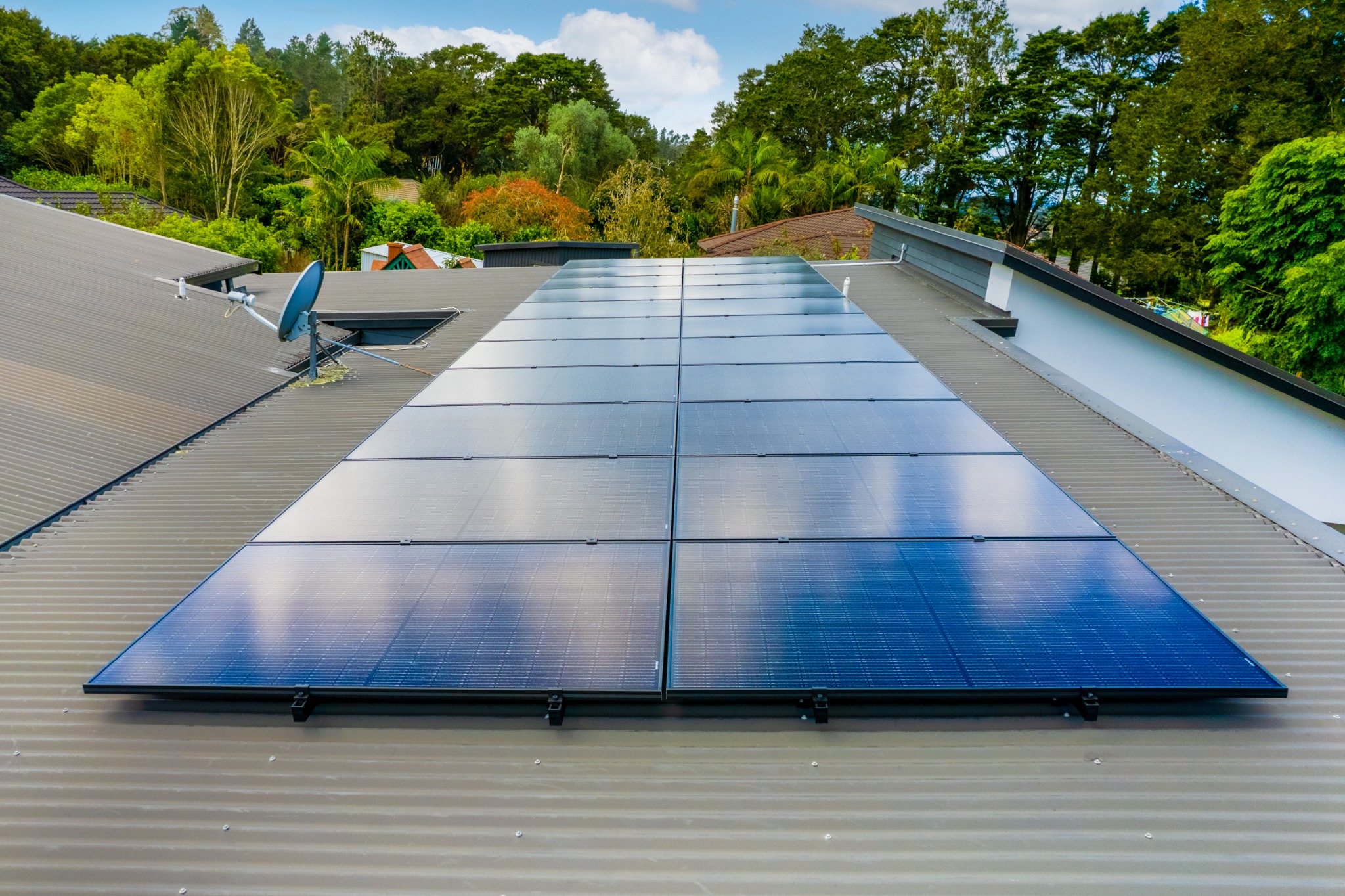 Completed rooftop solar panel array installed by Revolve Electrical in Northland