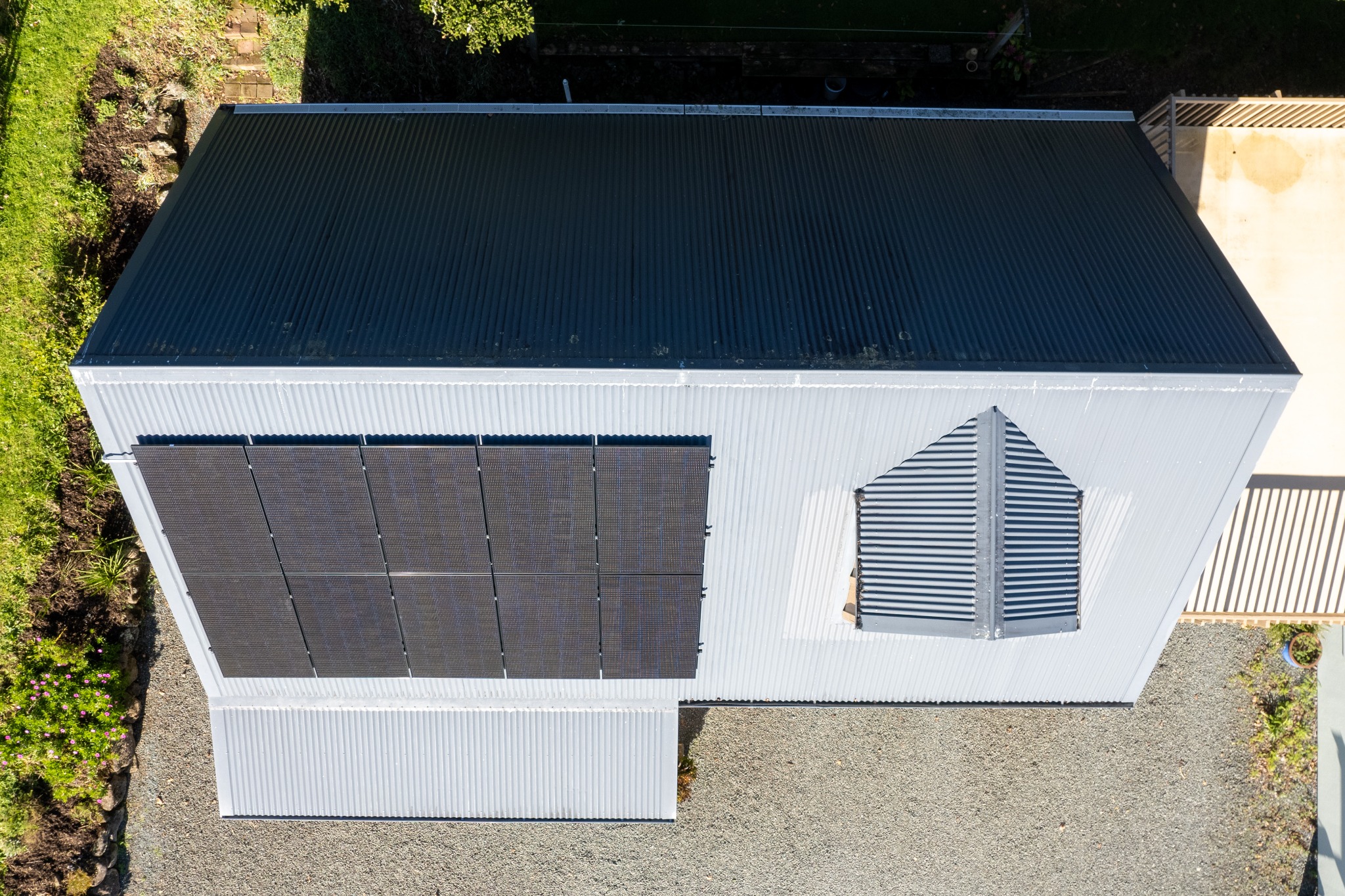 Aerial view of a residential solar installation completed by Revolve Electrical in Northland