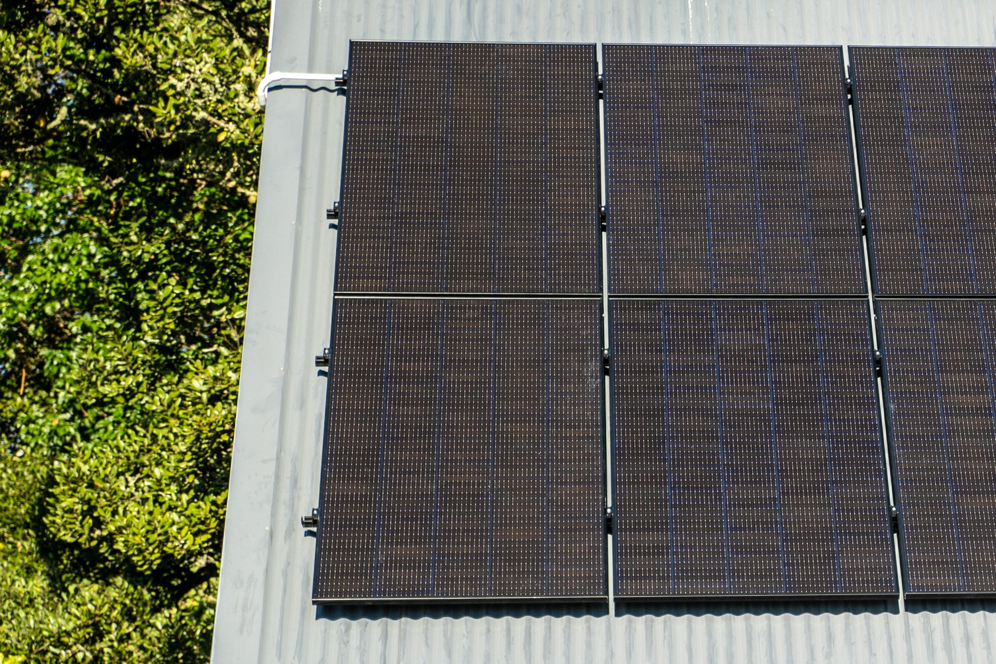 Close aerial detail of solar panels installed on a Northland home