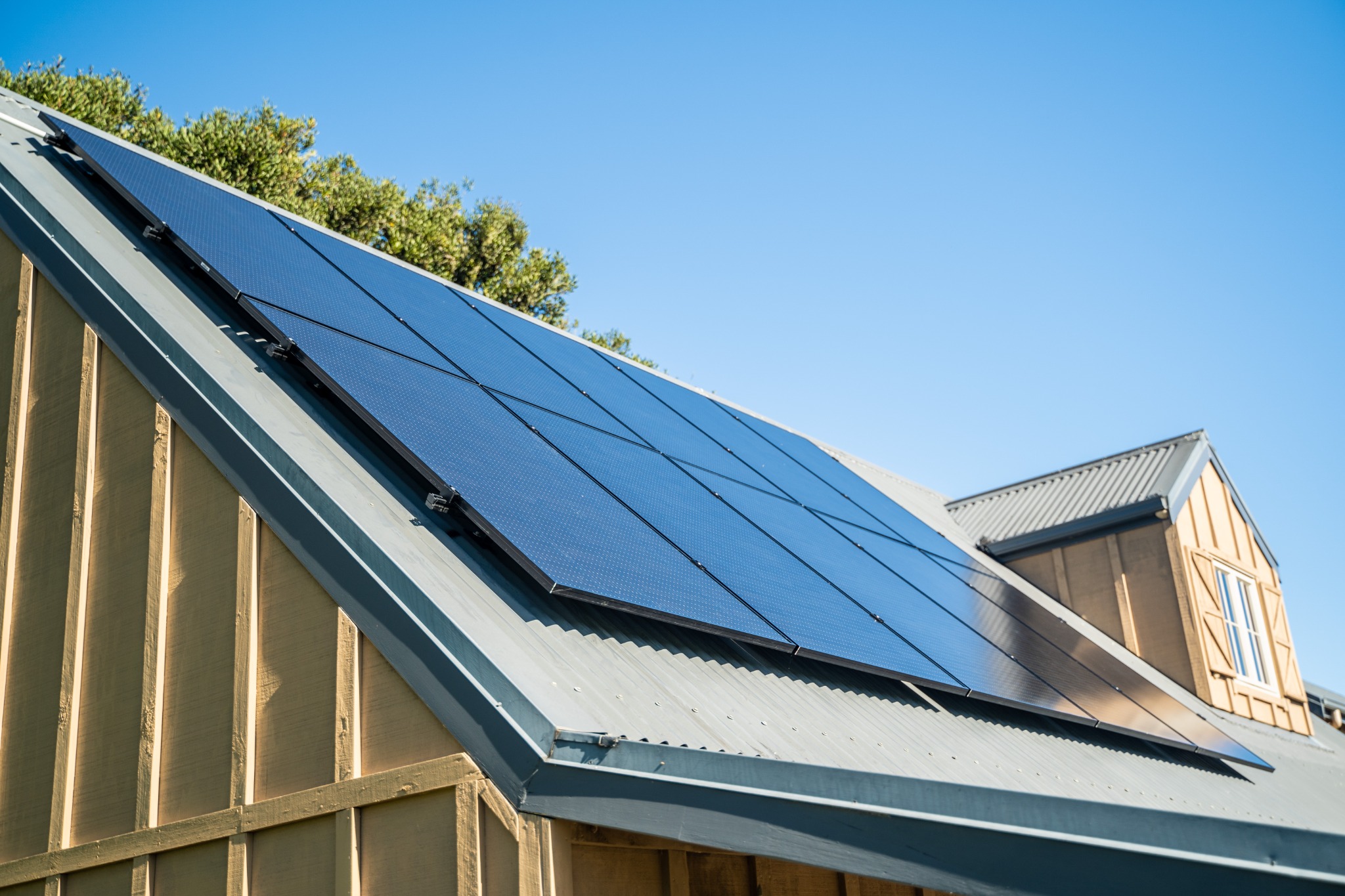 Angled view of a completed residential solar array in Northland