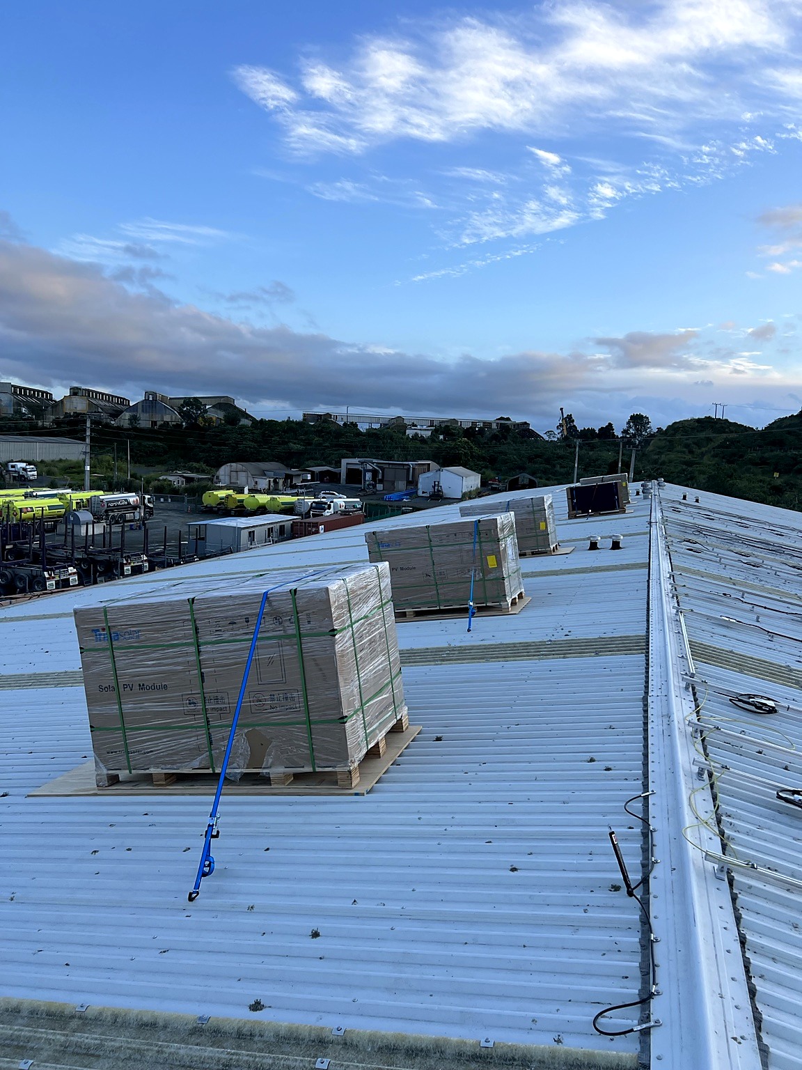 Solar panels delivered to a rooftop for installation
