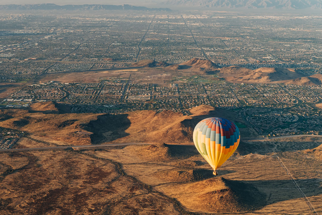Hot air balloon over Scottsdale desert at sunrise