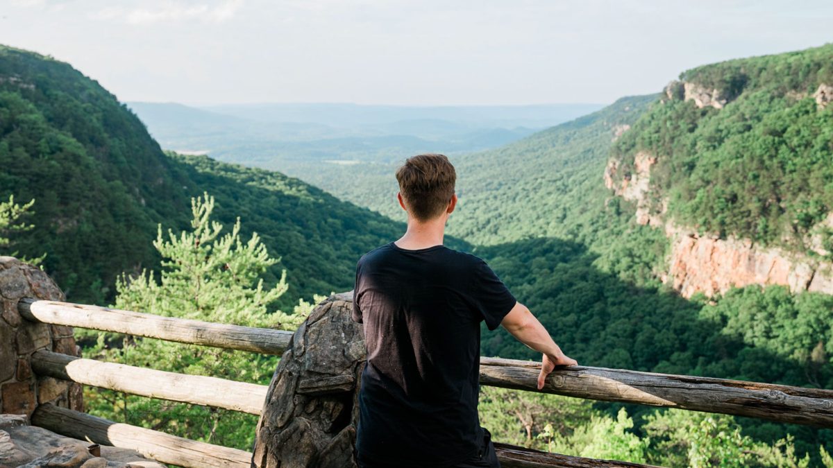 Man standing at overlook at Cloudland Canyon State Park, Georgia