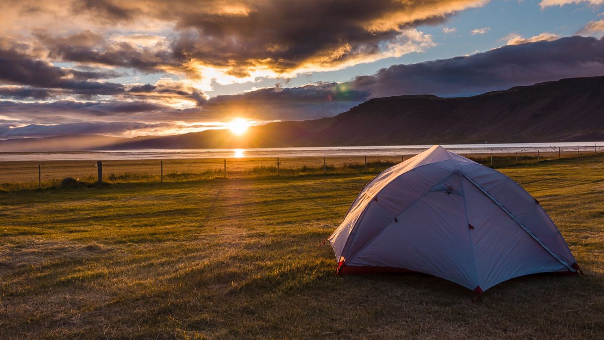 Tent camping in Iceland at sunrise