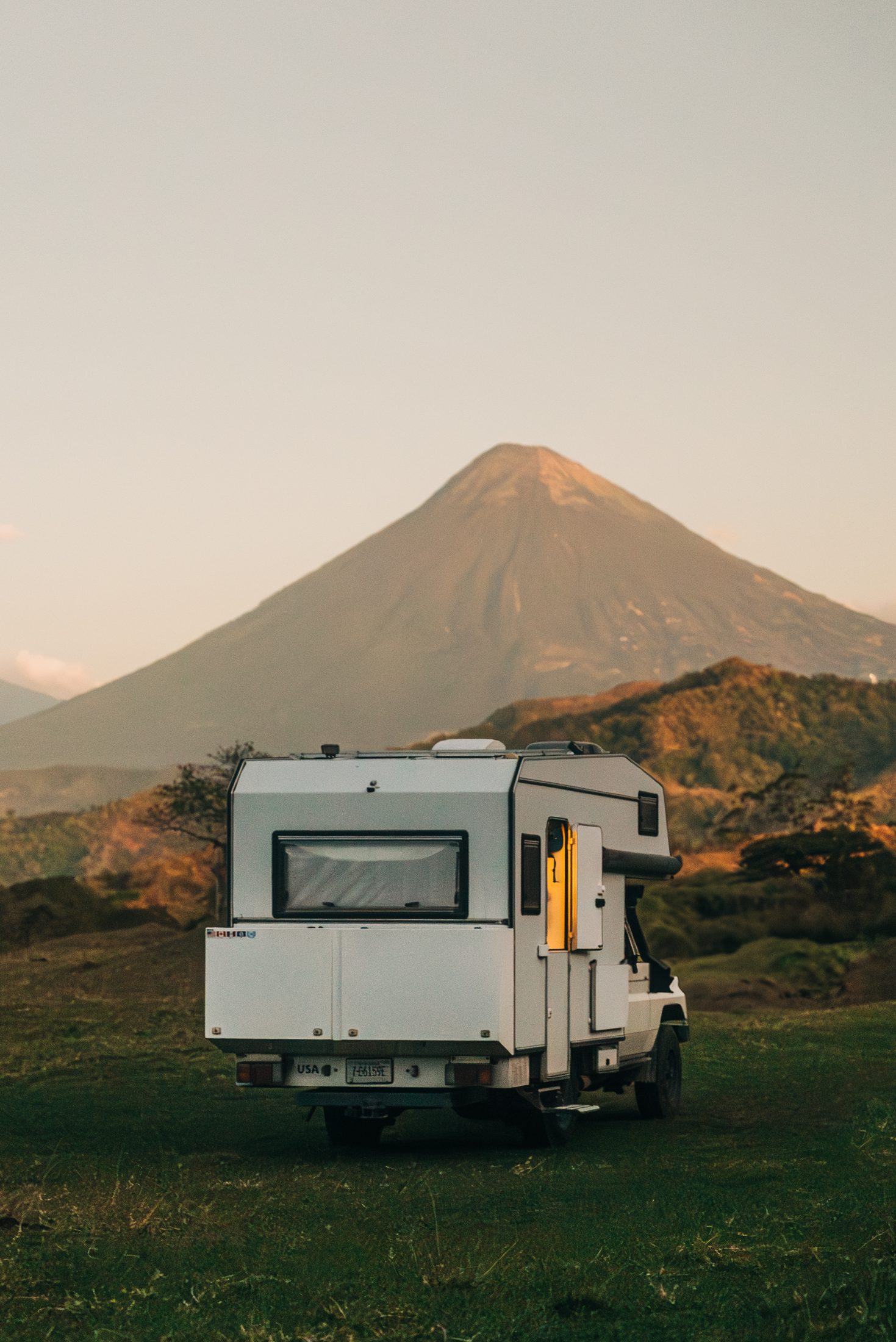 The Land Cruiser camped below a volcano in Guatemala at golden hour