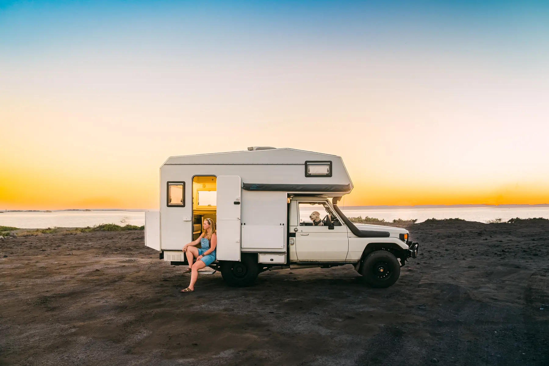The Land Cruiser camped below a volcano in Guatemala at golden hour