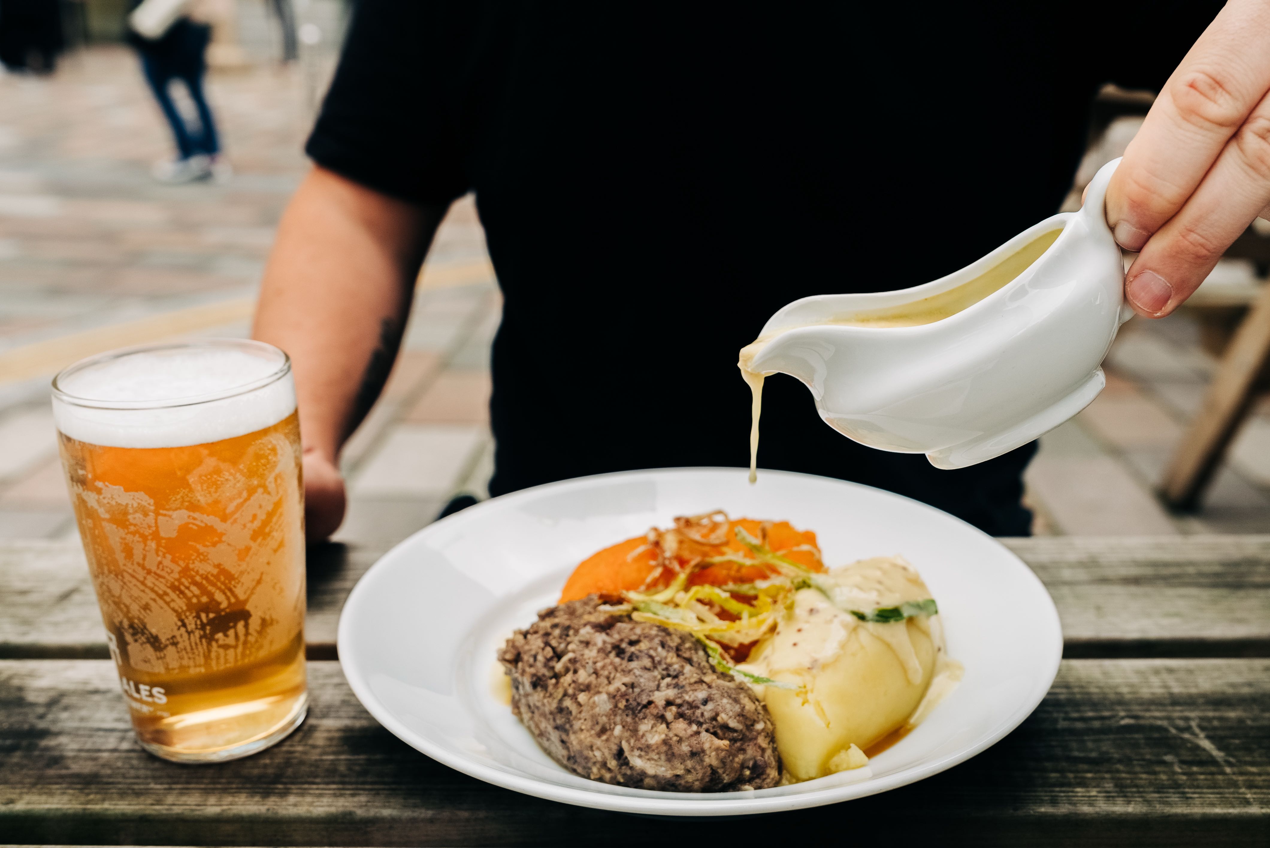 Haggis next to neeps (mashed turnips) and tatties (mashed potatoes) 