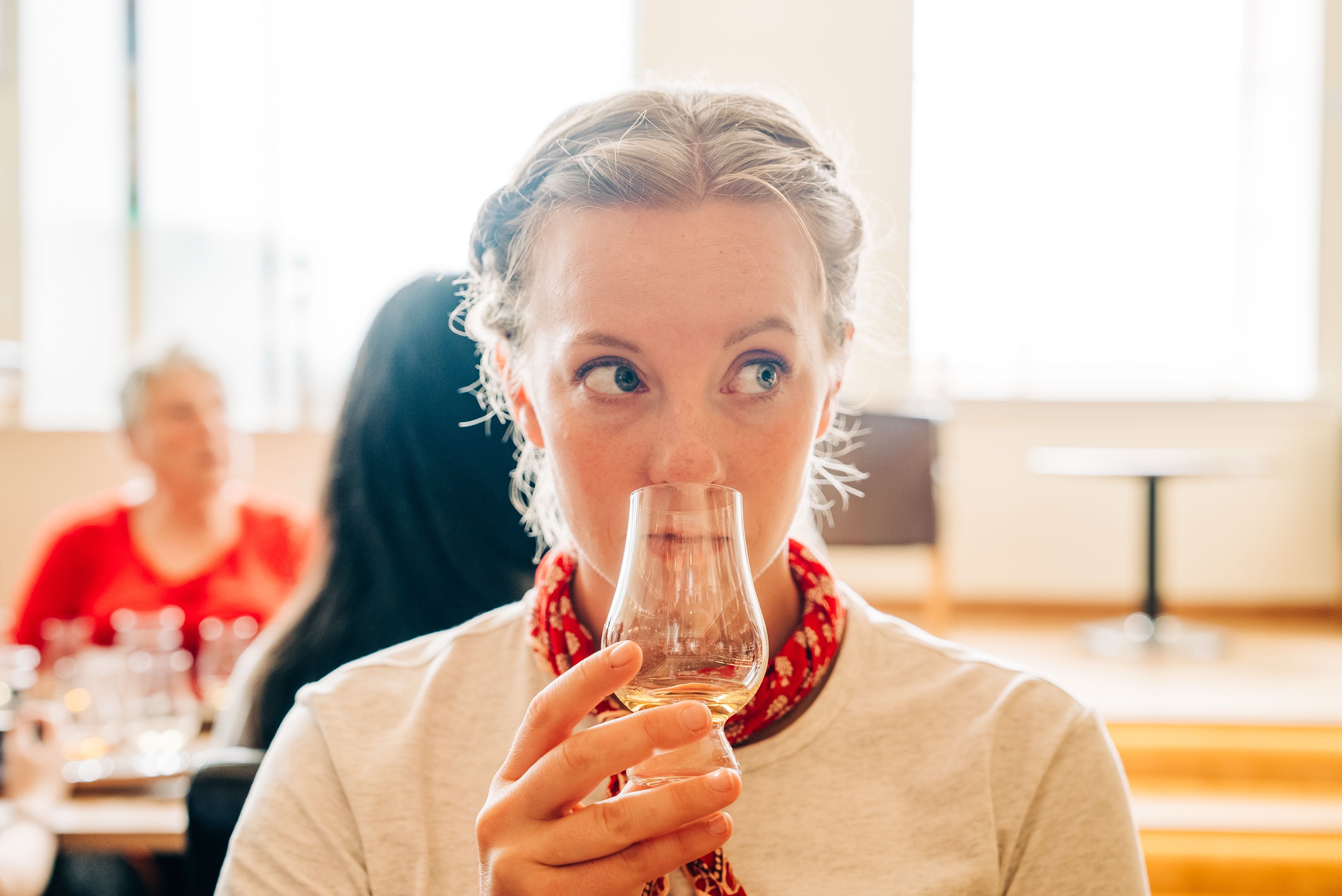 Sara smelling her whisky during a tasting session