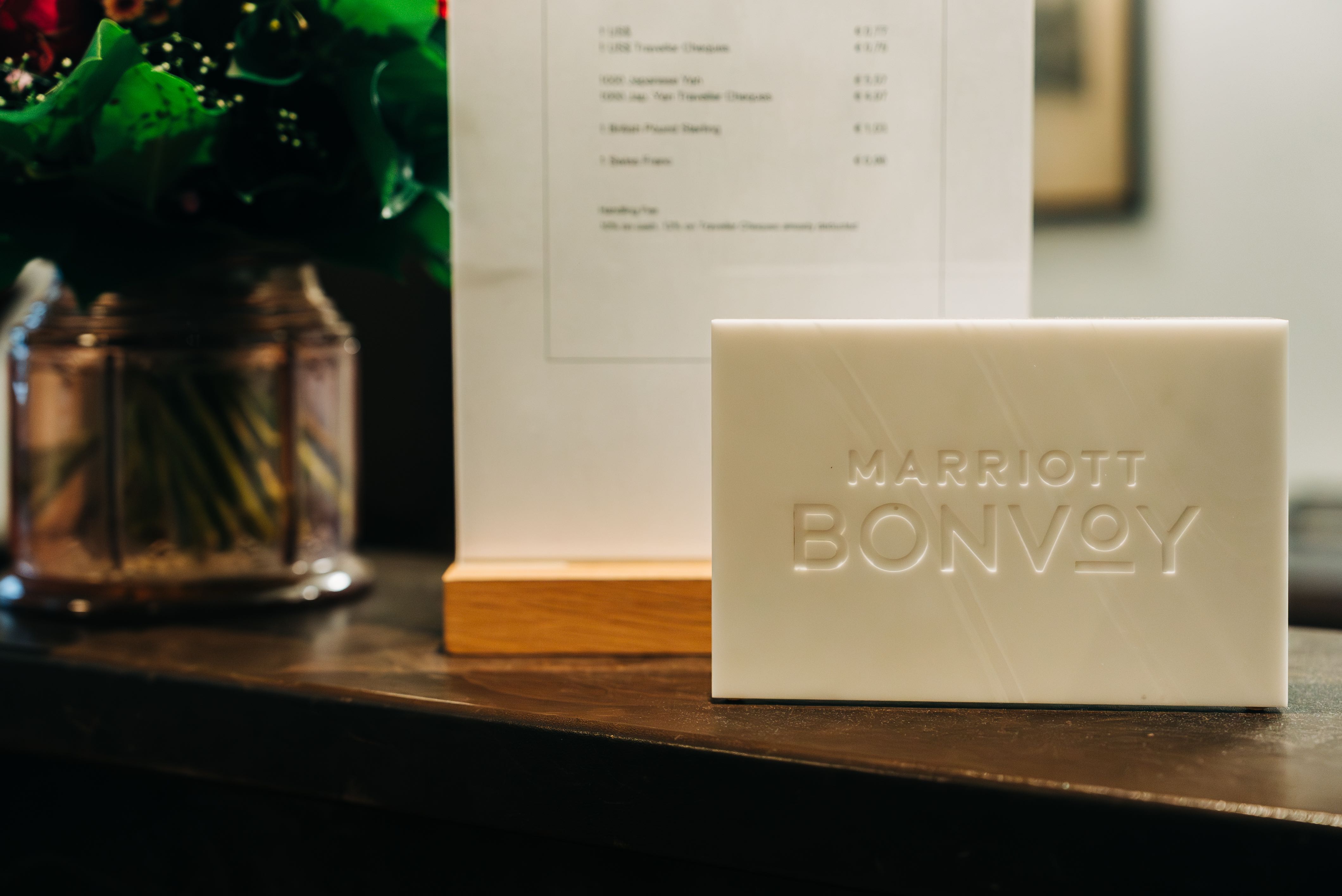 Marriott Bonvoy sign on front desk at Hotel Goldener Hirsch, Salzburg, Austria