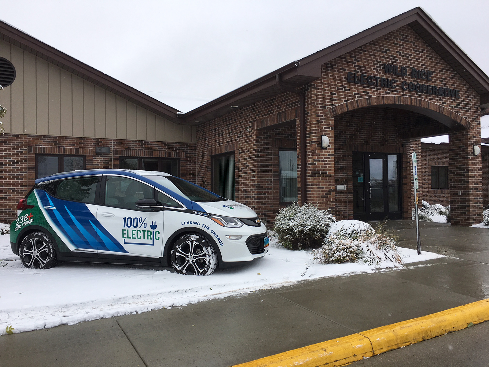 The Minnkota Bolt electric vehicle parked outside of Wild Rice Electric Cooperative in Mahnomen, Minnesota.
