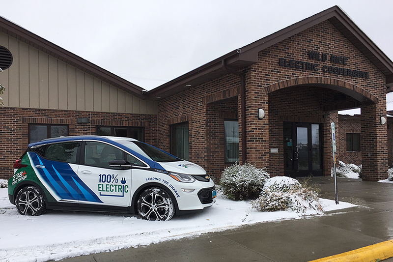 The Minnkota Bolt electric vehicle parked outside of Wild Rice Electric Cooperative in Mahnomen, Minnesota.