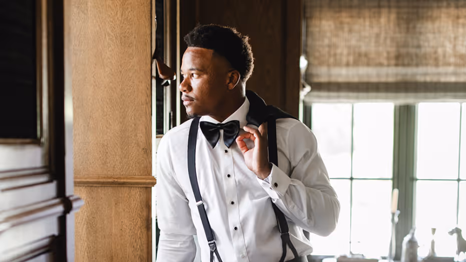 black man in custom tuxedo