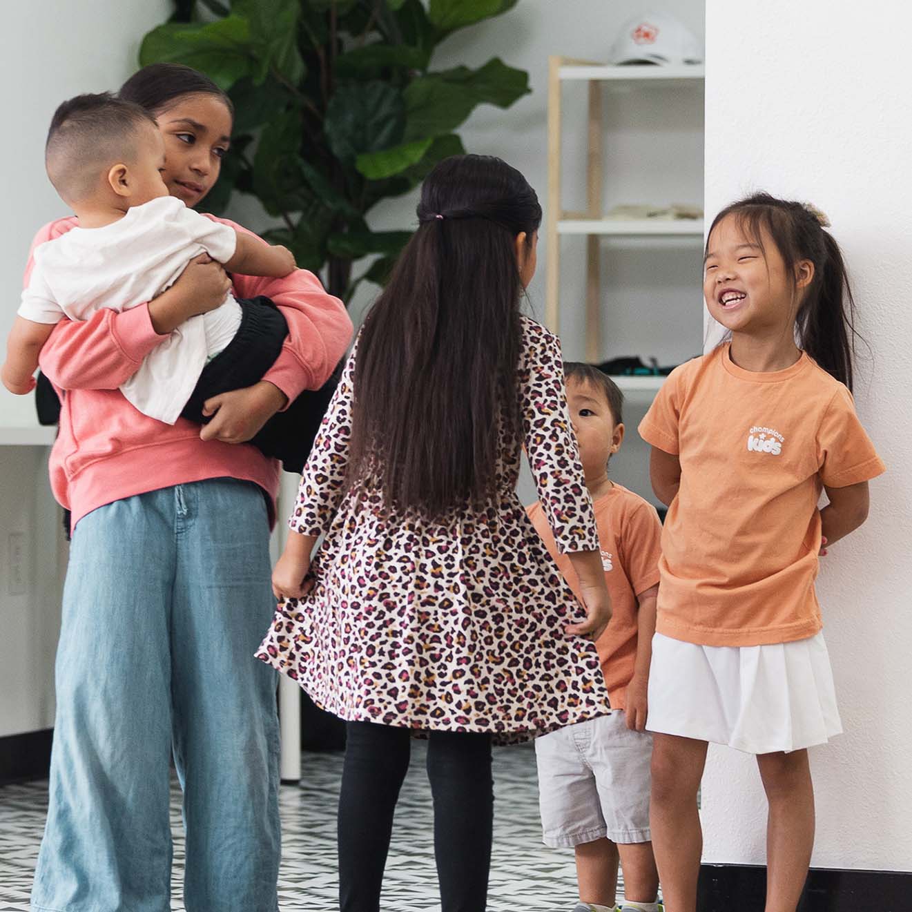 a group of kids smiling
