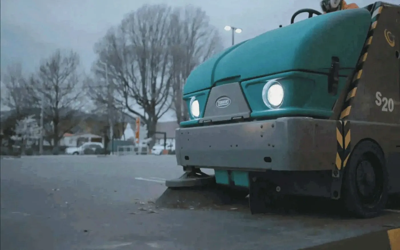 Commercial sweeper in action.