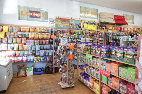Veterinary supplies on shelves in pet store, offering urgent and primary care services in Denver, Colorado.