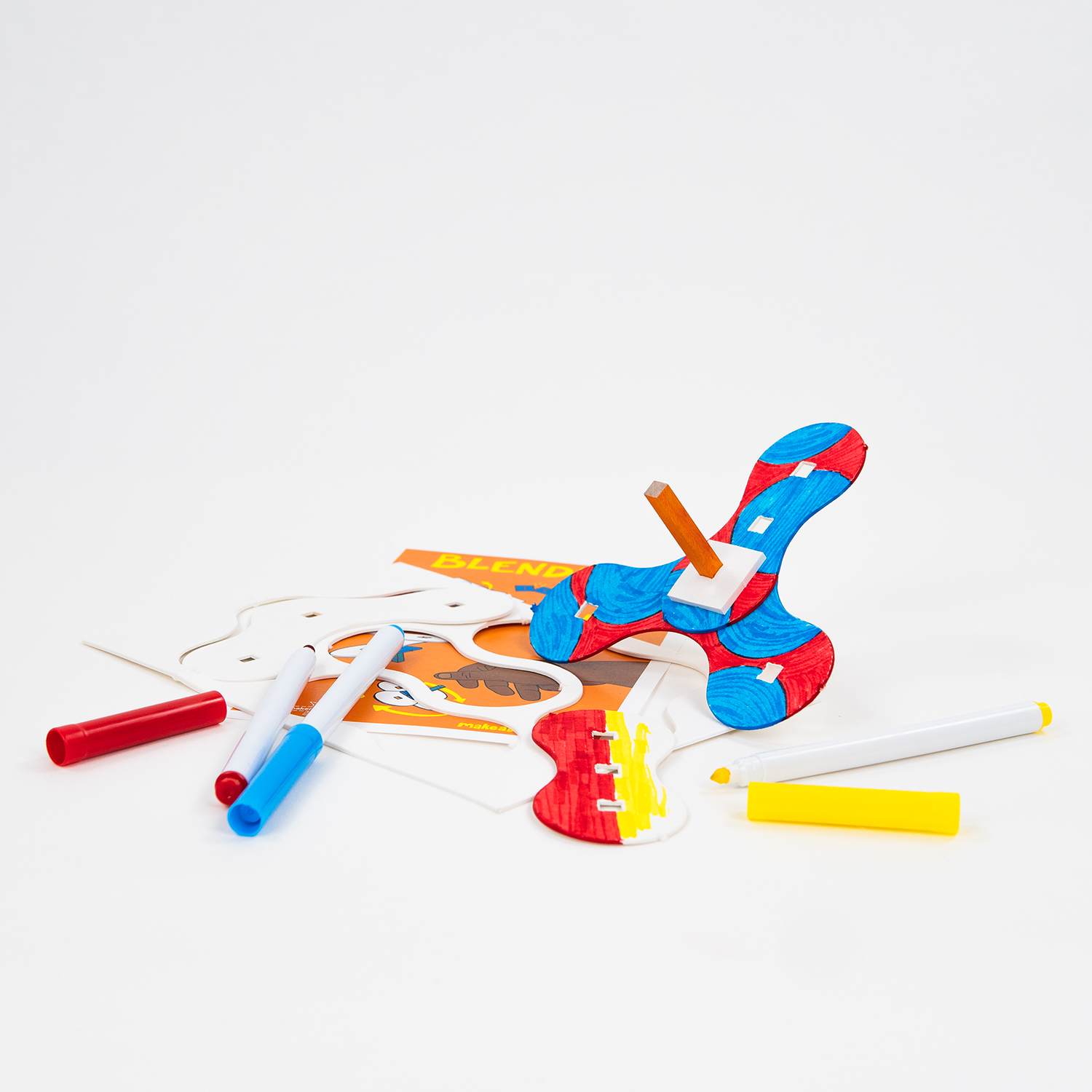 A finished Blendies spinning top with the markers that come in the kit