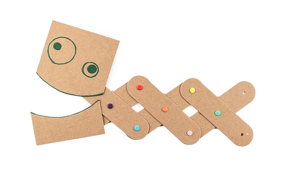 Learners building Art Machines kinetic sculptures from cardboard levers