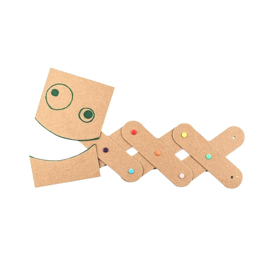 A built Art Machine with a drawn face on a folding cardboard arm