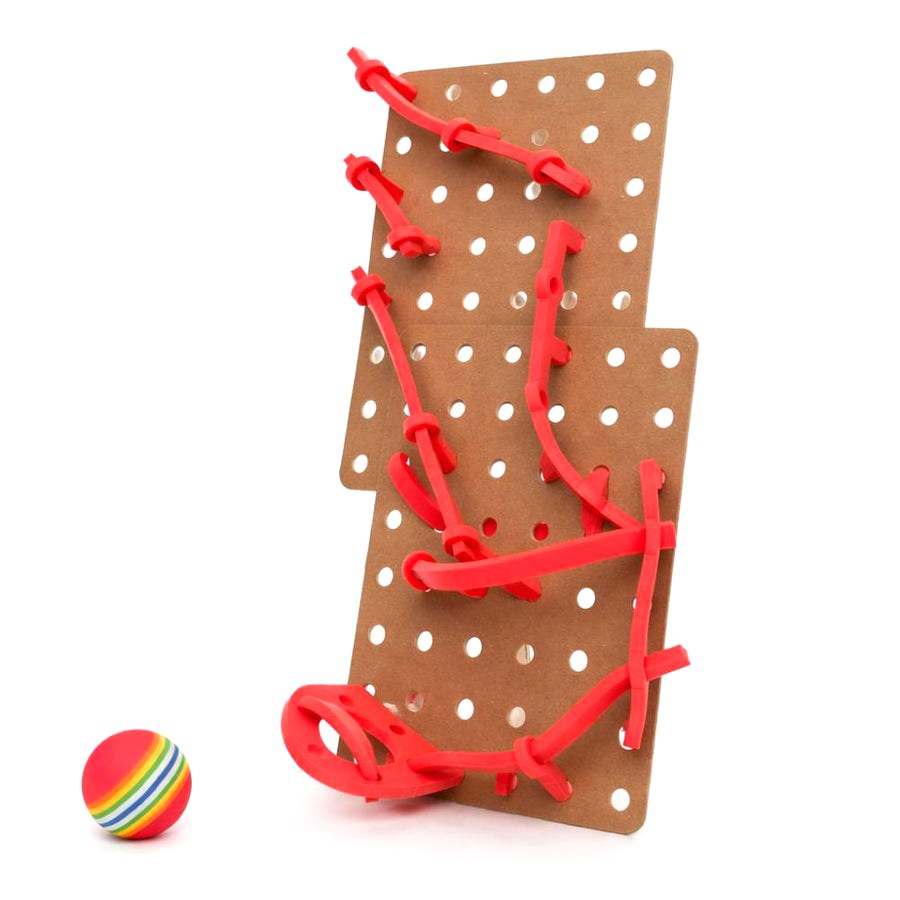 A built Mazes pegboard with red foam tracks and a striped ball