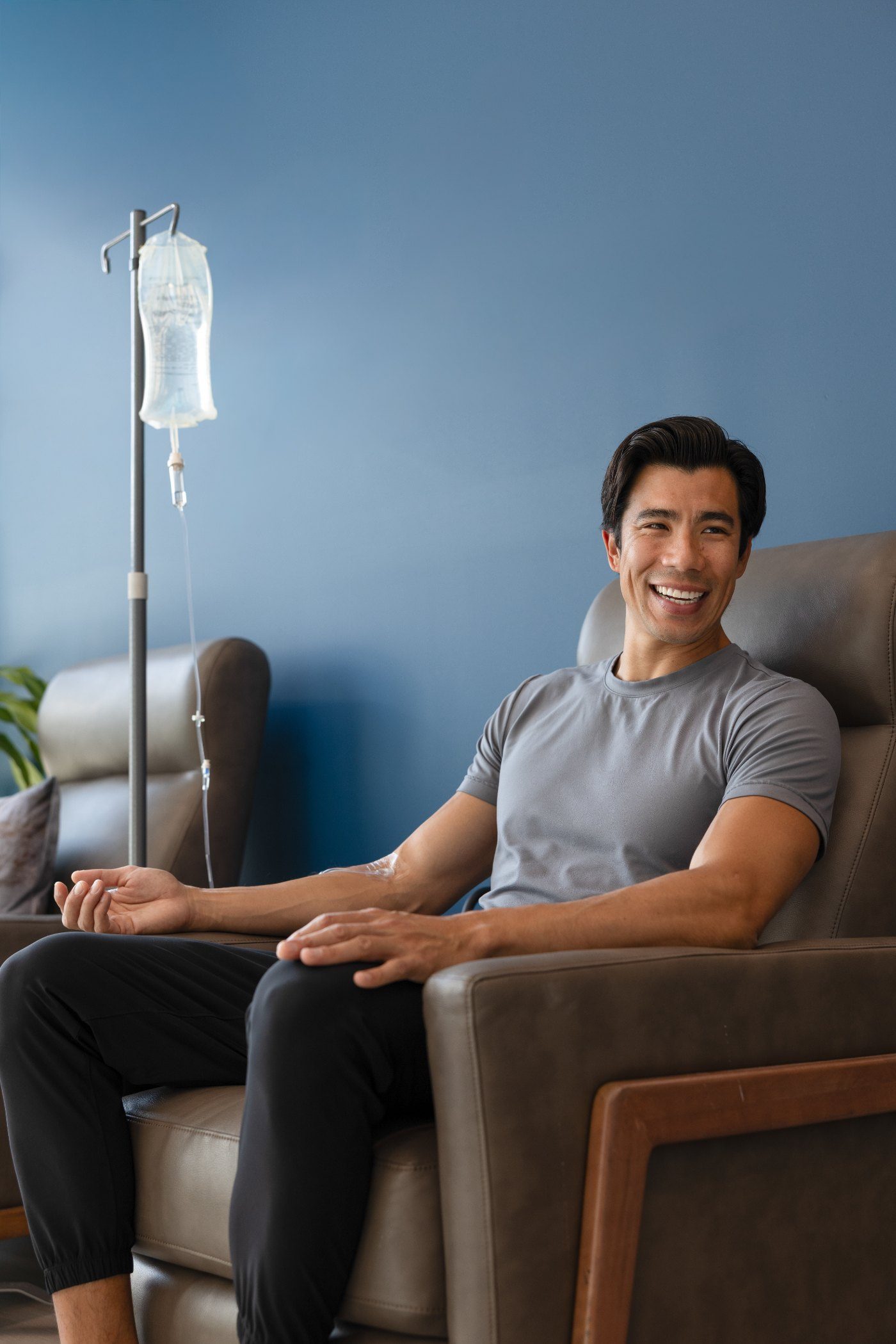 A member relaxing during an IV drip at a Restore studio