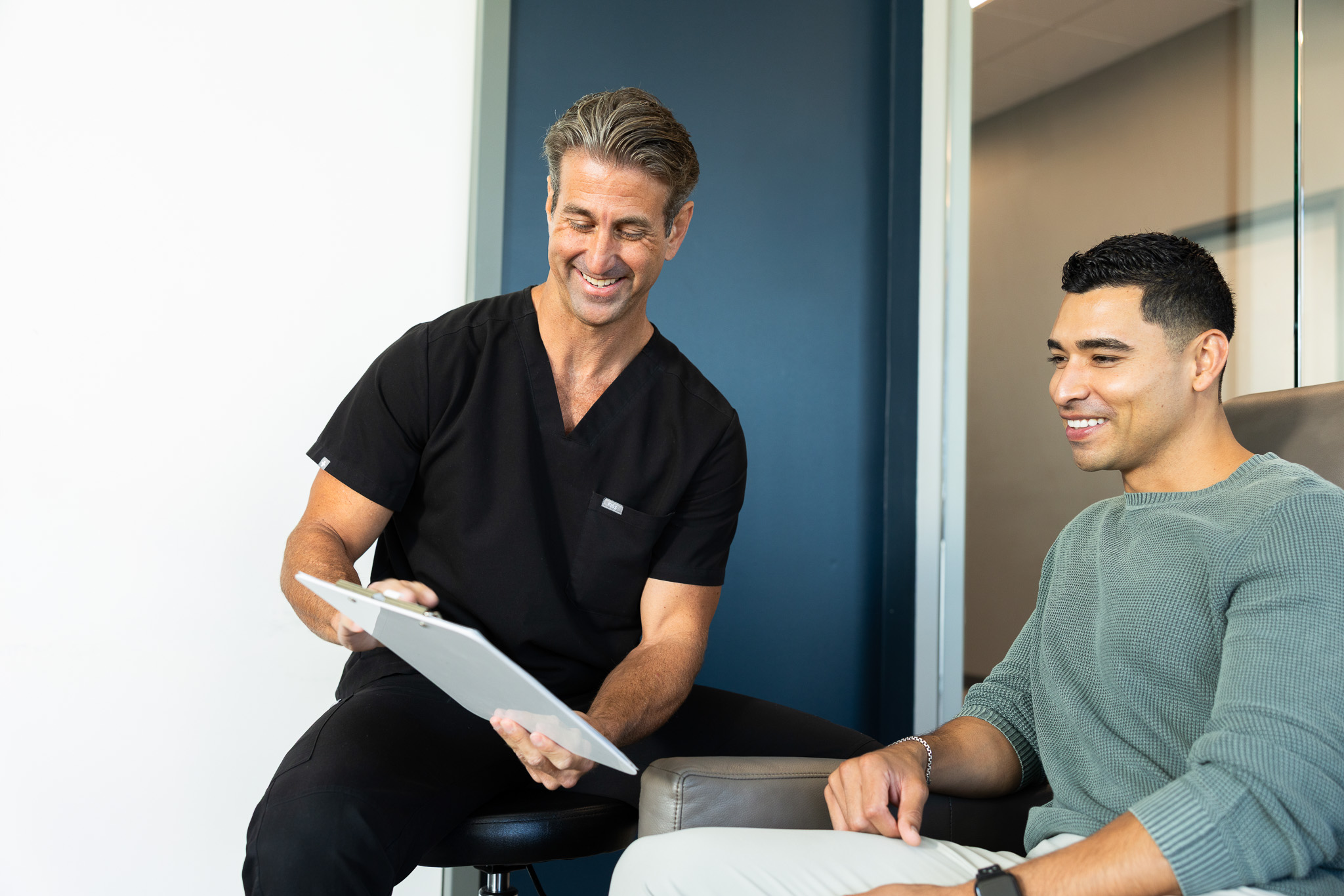 Restore clinician reviewing a plan with a client