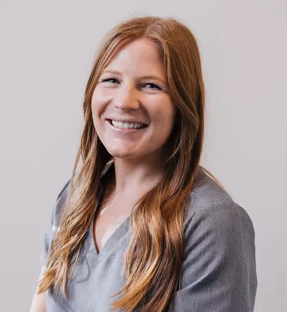  headshot of Dr. Jessica Apted, DVM, the compassionate Medical Director of Sploot