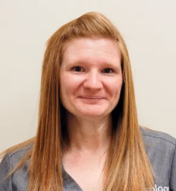  headshot of Dr. Jessica Apted, DVM, the compassionate Medical Director of Sploot