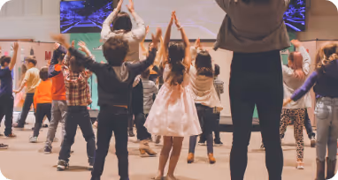 kids worshiping and dancing