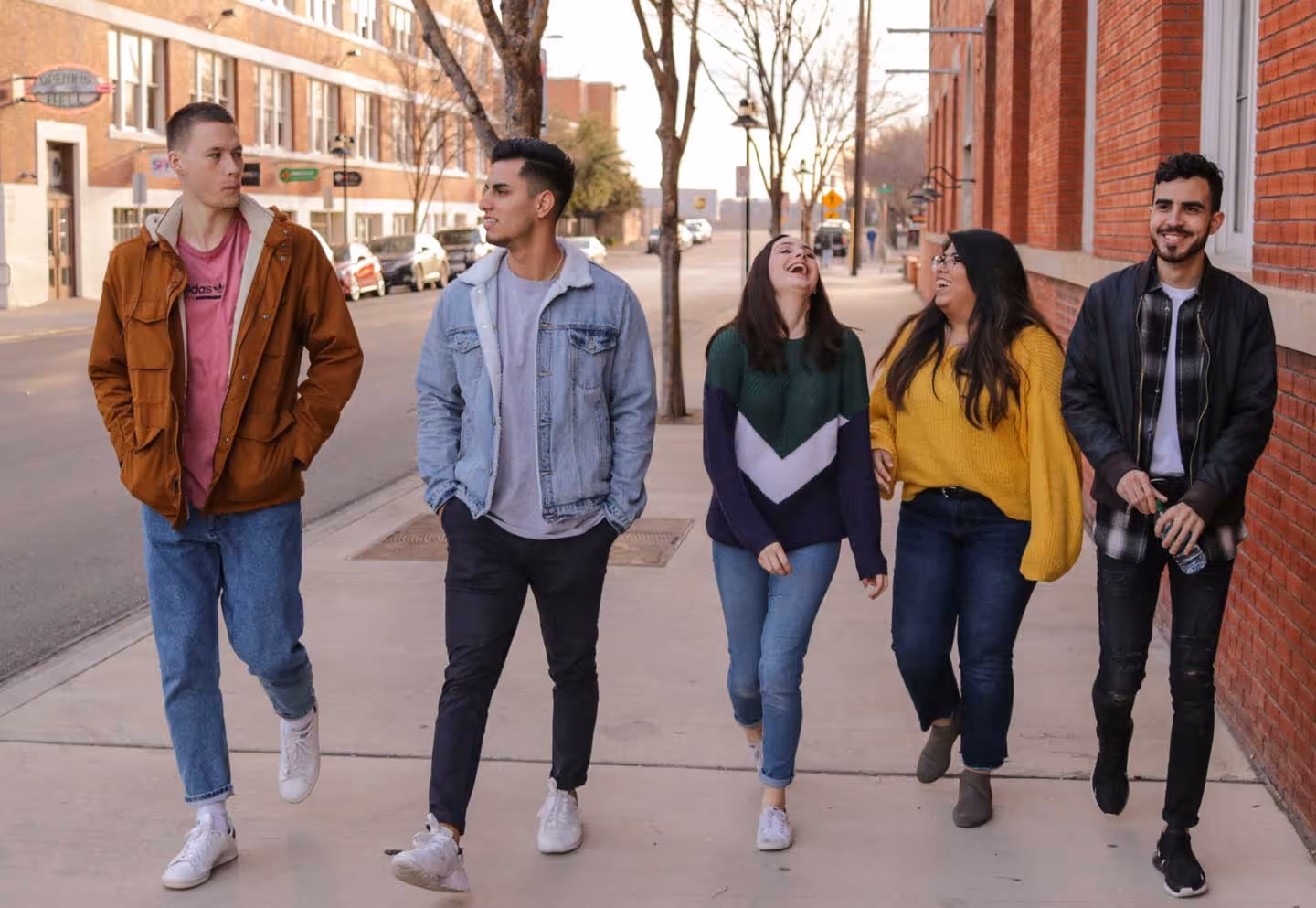 People hangling out while taking a walk