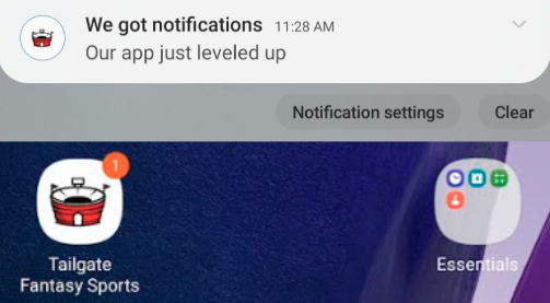 Screenshot of a cell phone screen, showing the Tailgate Fantasy Sports app with an unread push notification