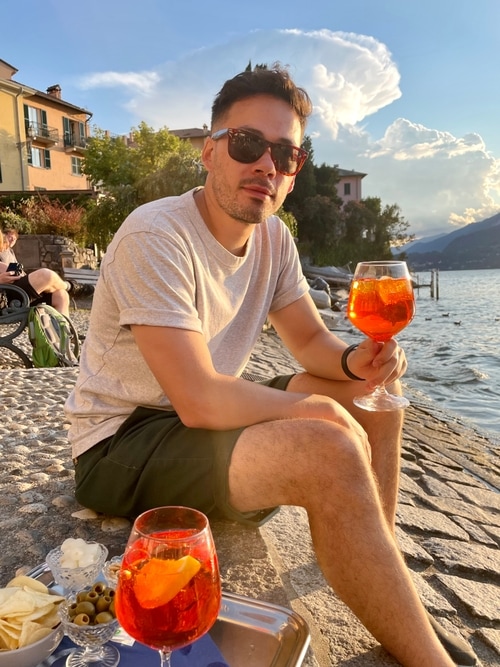 Kevin having an Aperol Spritz at Lake Como.
