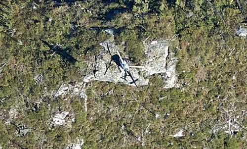 High resolution orthophoto of a helicopter on the ground taken at the Baie James by an airborne photogrammetric survey
