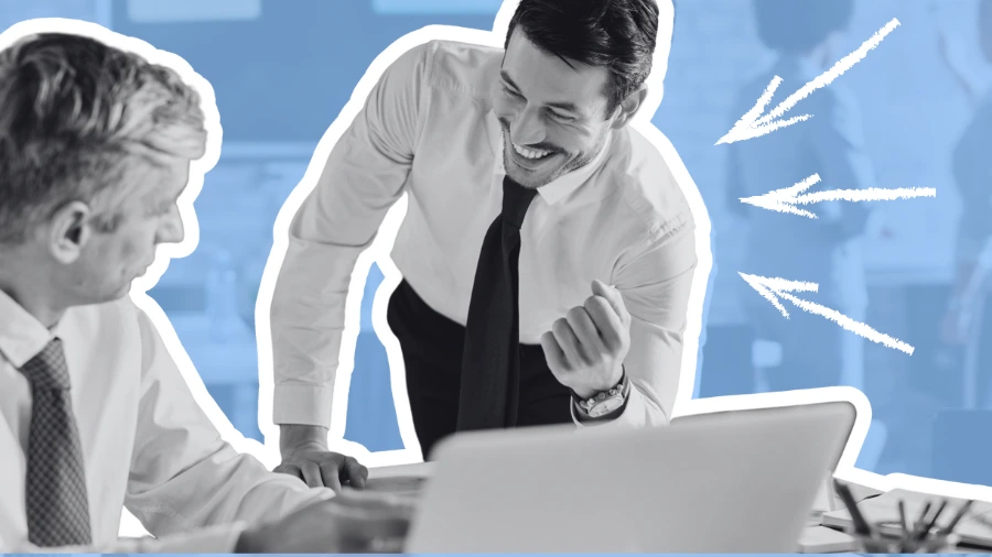 Smiling businessman leaning over laptop during discussion with colleague in office setting, highlighted with sketch-style arrows.