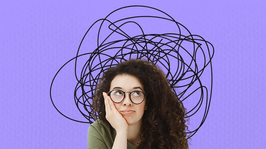 Woman with curly hair and glasses looking thoughtful, with a tangled scribble above her head on a purple background, symbolizing confusion or overthinking.
