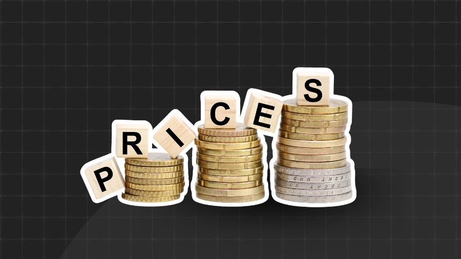 Stylized sticker-style illustration of wooden blocks spelling "PRICES" rising across three stacks of gold and silver coins, set against a dark grid background to represent freelance rate increases and financial growth.