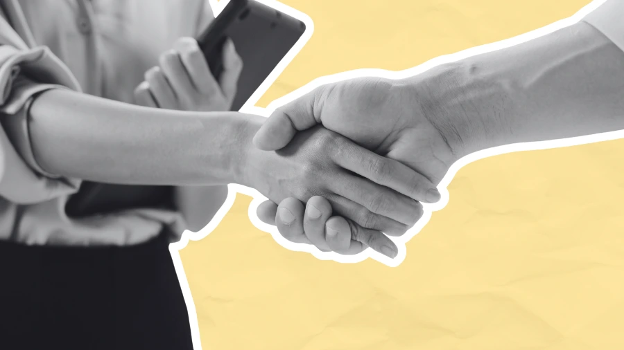 A black-and-white cutout of two people shaking hands over a wrinkled yellow paper background. One person holds a tablet, and the handshake is outlined with a th