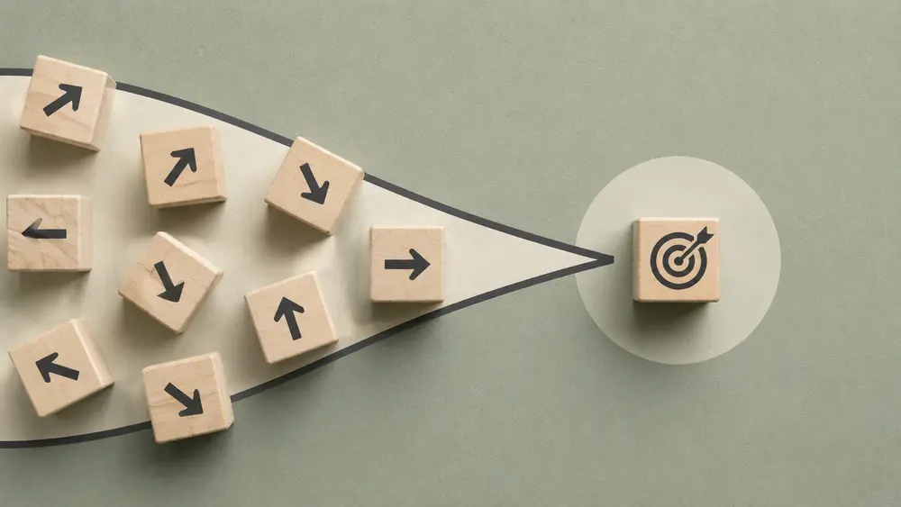 Minimal still-life thumbnail featuring scattered directional blocks narrowing into a single target icon, symbolizing simplified choices improving conversion rates.