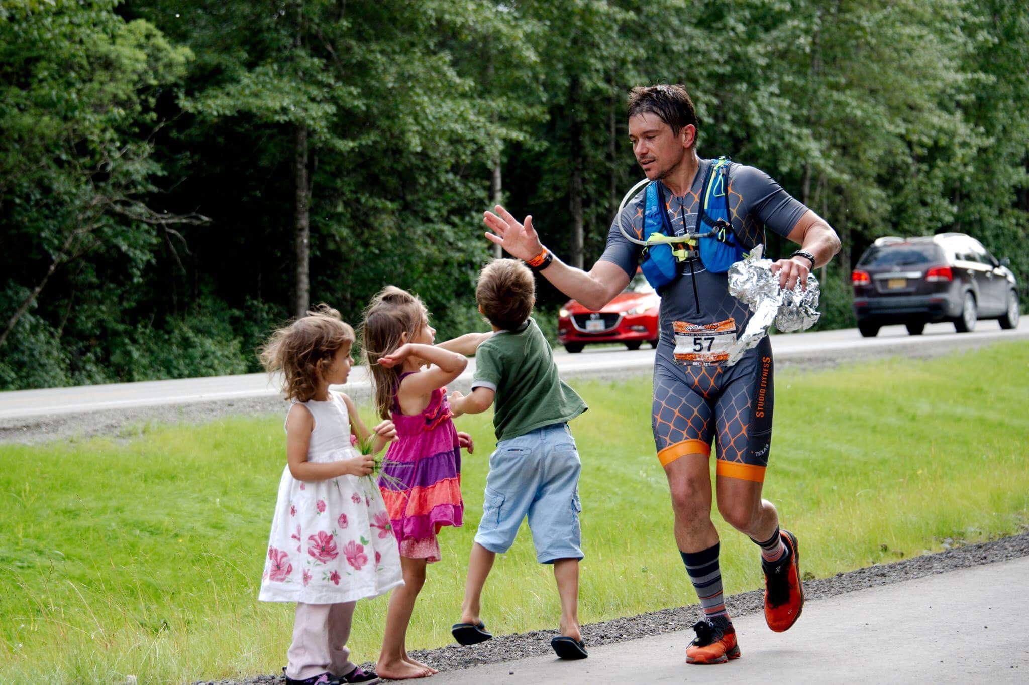 AlaskaMan race day, high five
