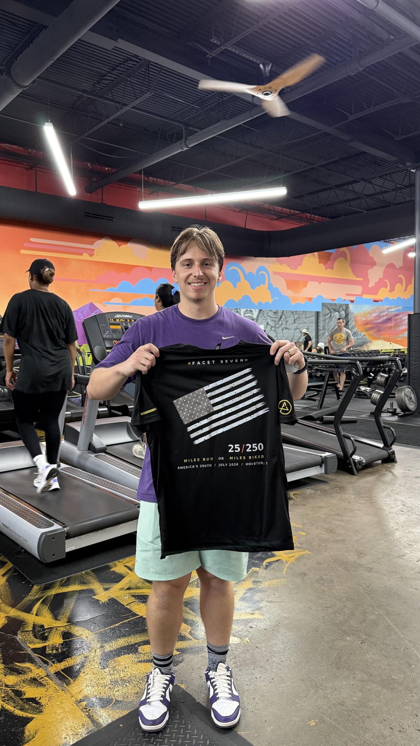 Facet Seven member with 25/250 finisher tee