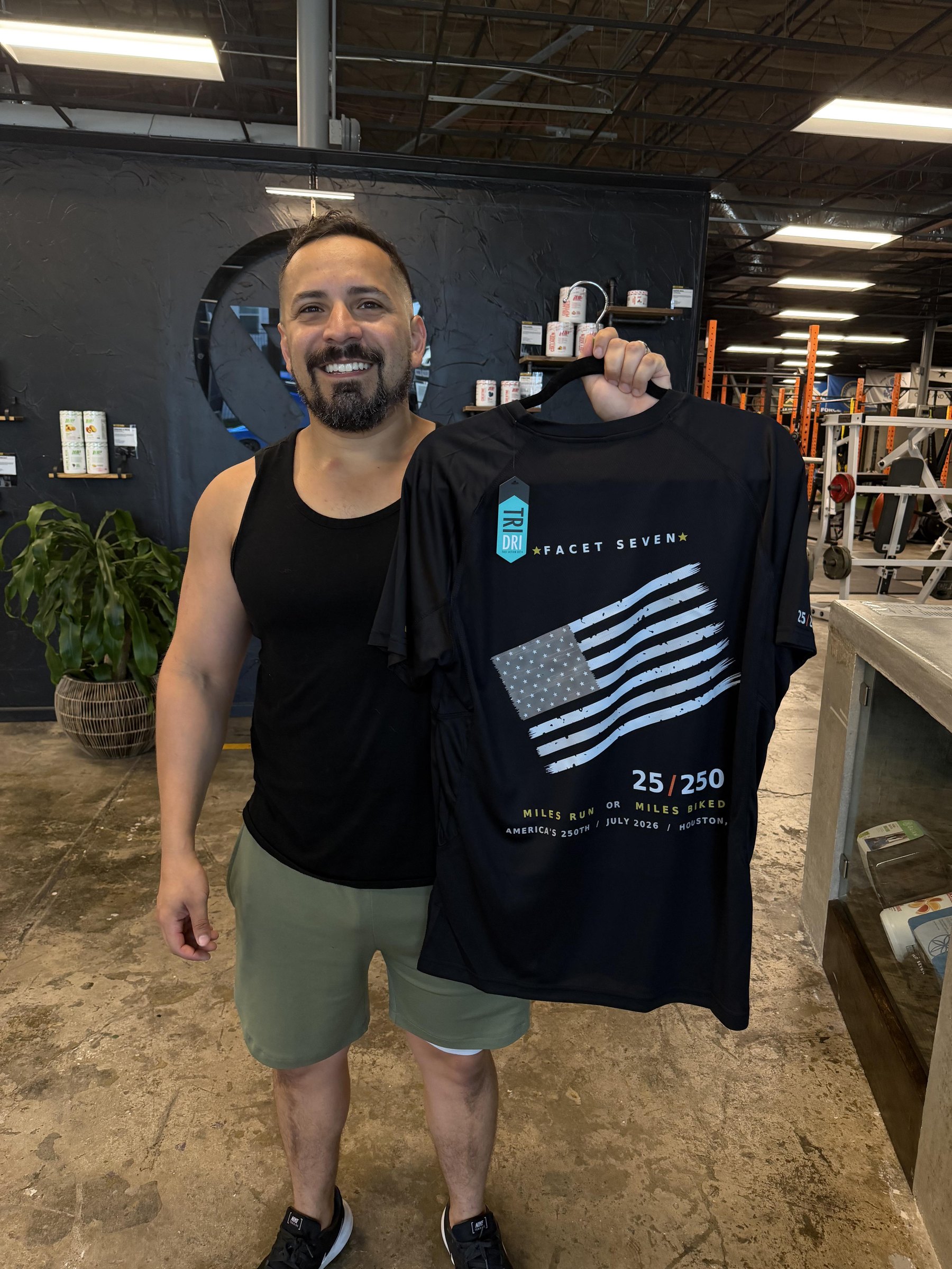 Facet Seven member with 25/250 finisher tee