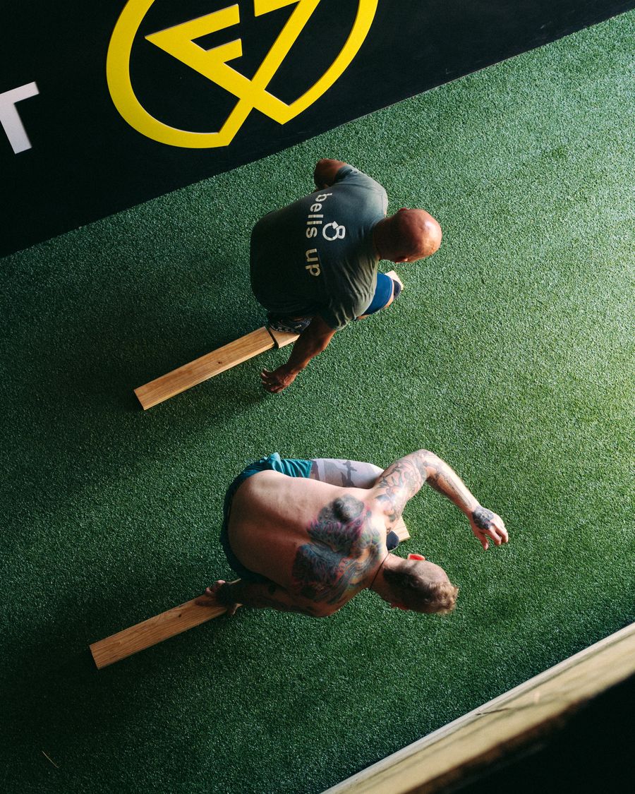 Members balancing on boards from above