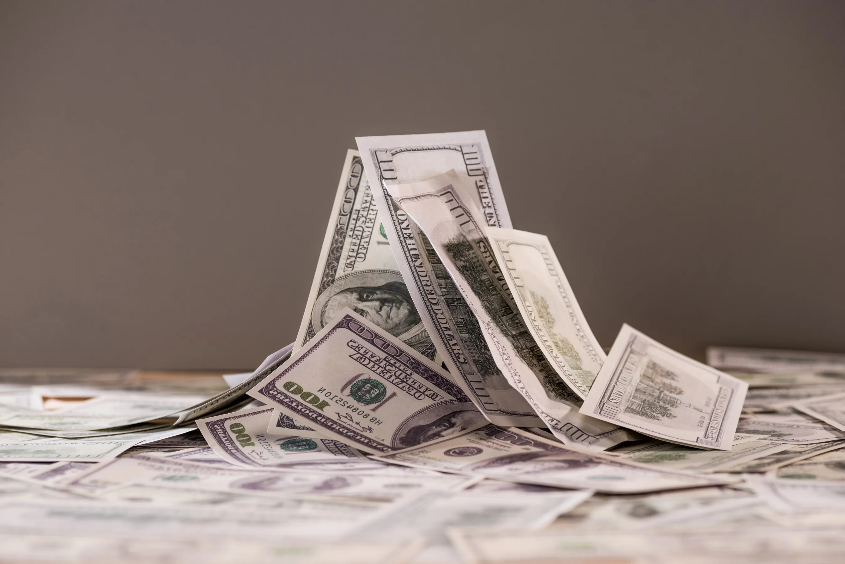 Close up of US dollars to represent high ROAS with low profit