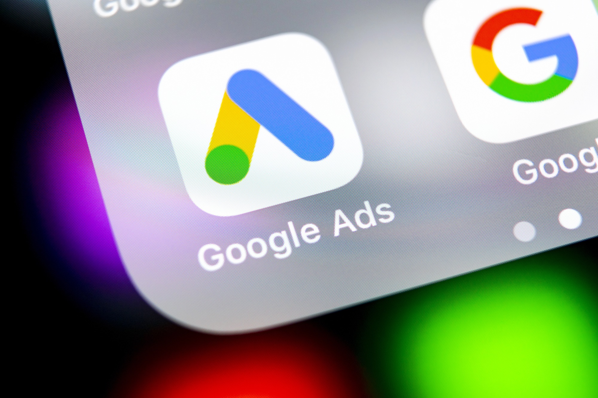 Very near close-up shot of a Google Ads application on a phone screen.