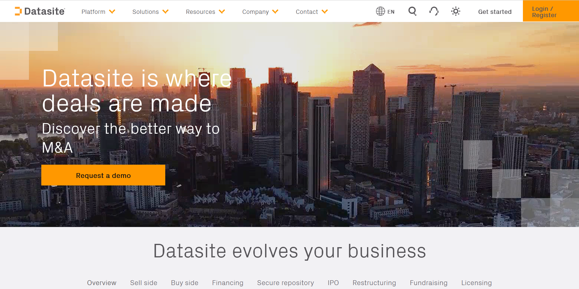 Screenshot of Datasite homepage featuring a silent video panning up onto a city skyline as the sun sets. Overlaying the video is the headline, "Datasite is where deals are made."