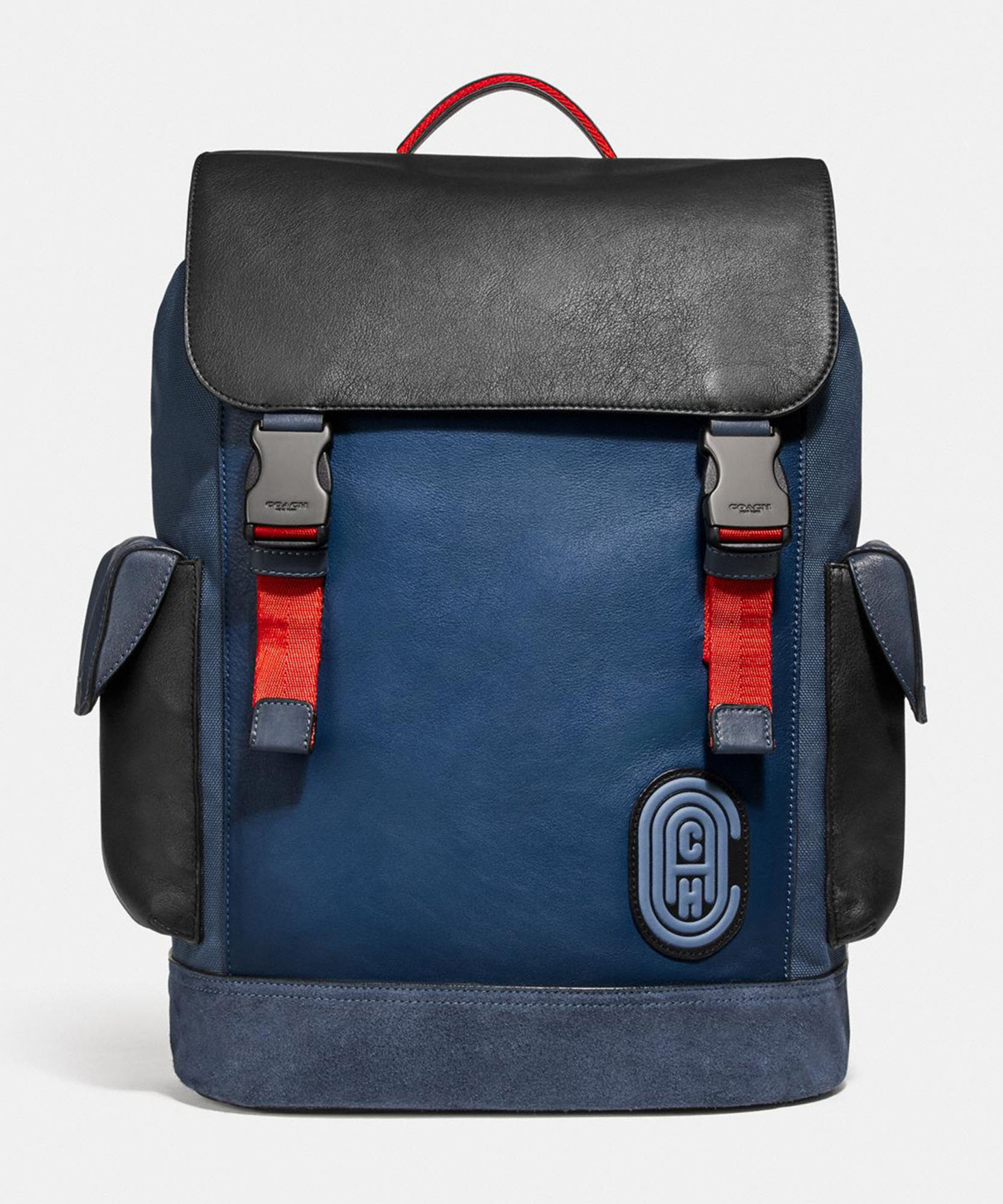 photo of a blue backpack with coach logo